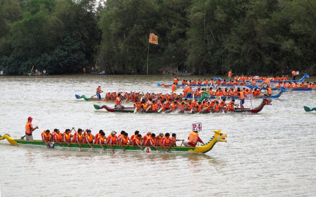 Annually traditional boat race on Han river of Danang city, Vietnam ...